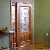 solid glass panel door